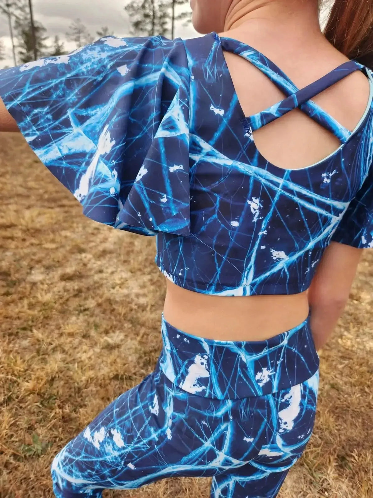 Navy cracked ice print fabric in modal jersey, shown as a girl's backless top and leggings.