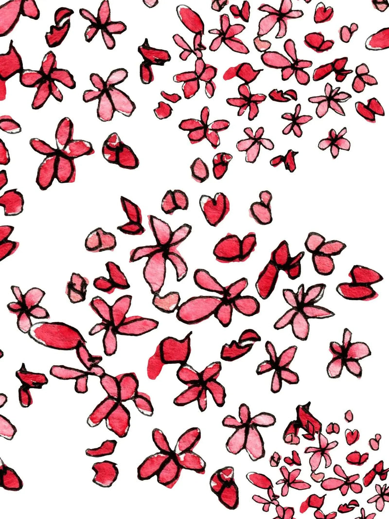 Fabric with a pattern of scattered pink and red watercolor flowers on a white background.