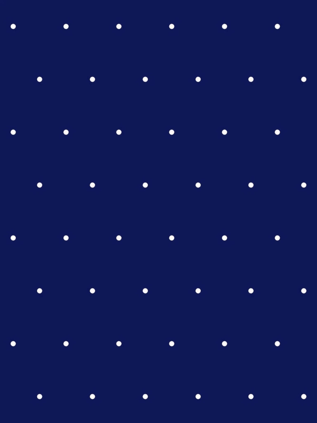 Navy fabric with a white polka dot pattern.