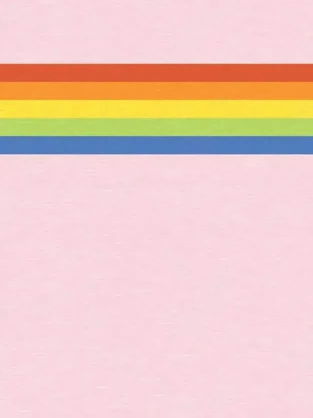 A pink fabric with a horizontal rainbow stripe panel across the top.