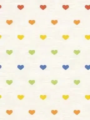 White athletic knit fabric printed with scattered multicolored heart patterns.