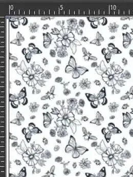 White fabric print with black outline butterflies and flowers for coloring.