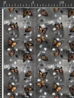 Gray fabric with a repeating print of orange monarch butterflies.