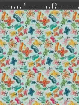 A light blue fabric with a pattern of colorful painted butterflies.