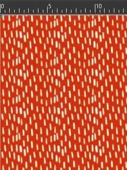 Red fabric with a pattern of small, scattered white dashes.