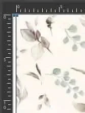 A close-up of fabric with a pattern of green and brown eucalyptus leaves.