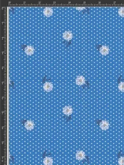 Blue fabric with white polka dots and scattered white floral clusters.
