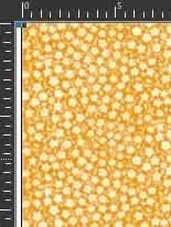 Orange fabric with a repeating pattern of small white flowers.