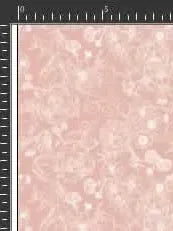 A pink fabric with a white stenciled floral pattern.