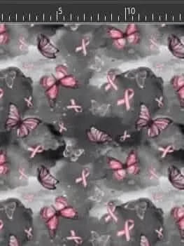 Fabric with pink butterflies and breast cancer ribbons on a gray and black background.