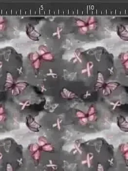 Fabric with pink ribbons and butterflies on a gray background.