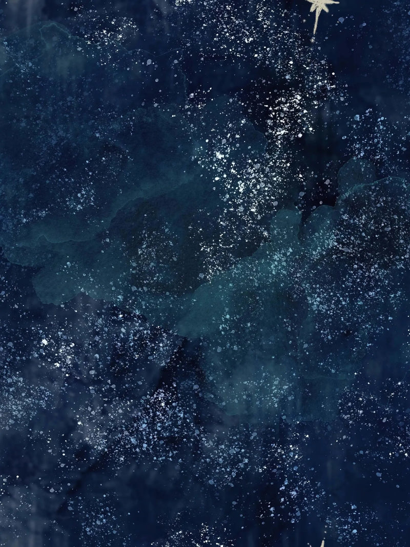 Dark blue fabric with white speckles and a light-colored star in the upper right.