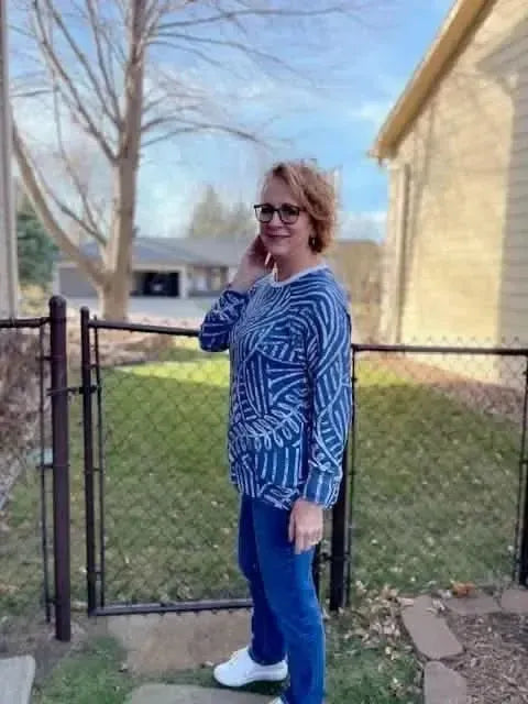 Blue geometric Art Deco flapper print fabric on stretchy modal jersey base.