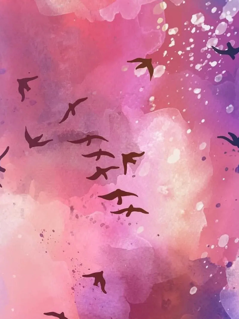 A watercolor background in pink and purple with silhouettes of birds flying.