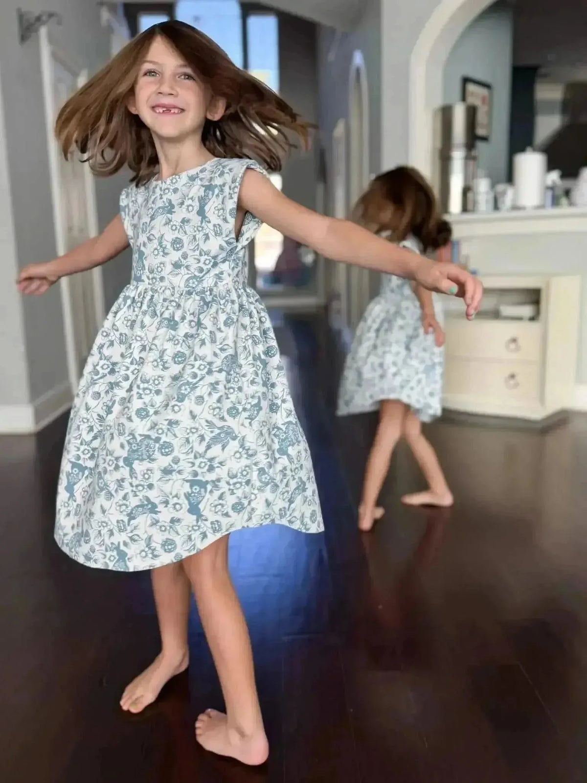 Blue floral Bunny Bramble fabric with bunny motifs, sold by the yard.