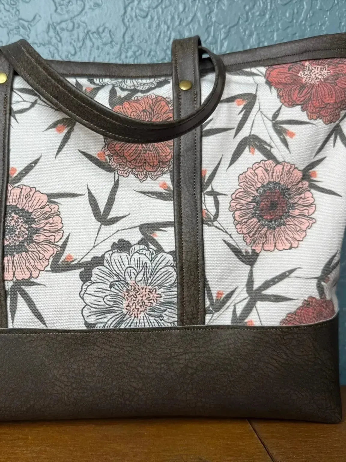 Twilight Bramble floral fabric with pink flowers and black bamboo on white background.