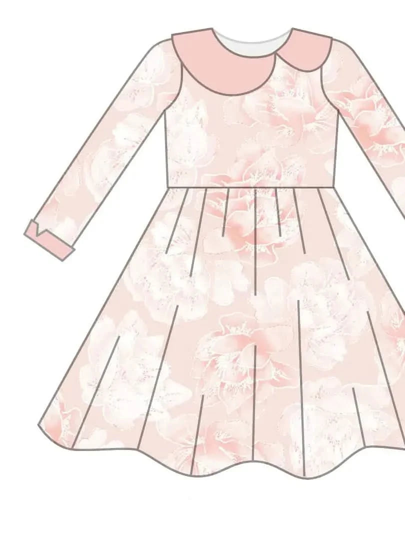 A pink dress with a peter pan collar and long sleeves, featuring a floral pattern.