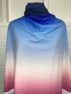 Fabric with a blue, white, and pink ombre gradient.