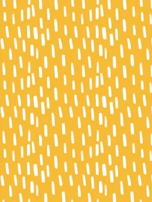 Dark yellow fabric with a pattern of short, vertical white dashes.