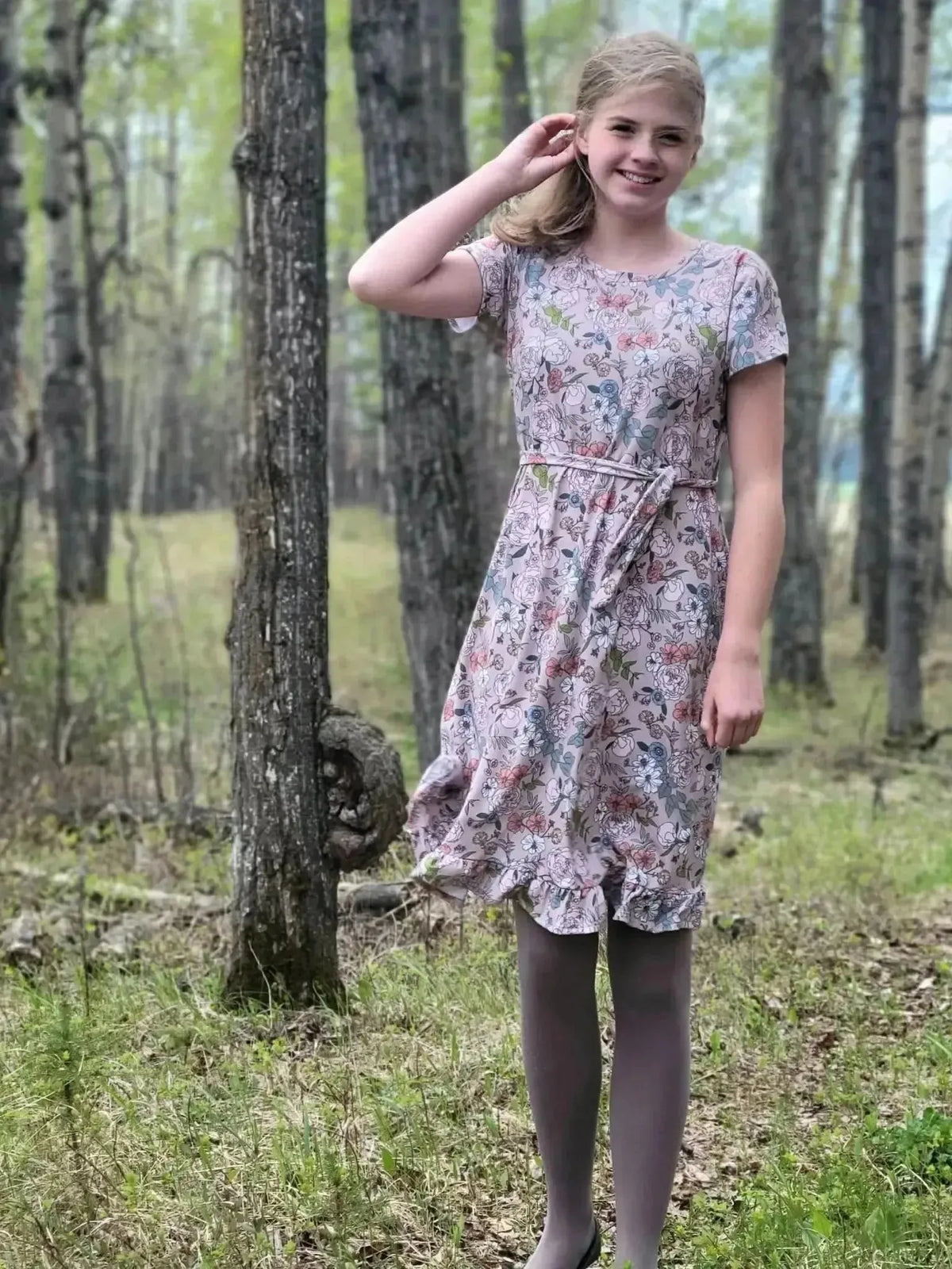Tan Japanese floral fabric with pink and white blossoms on a beige background.