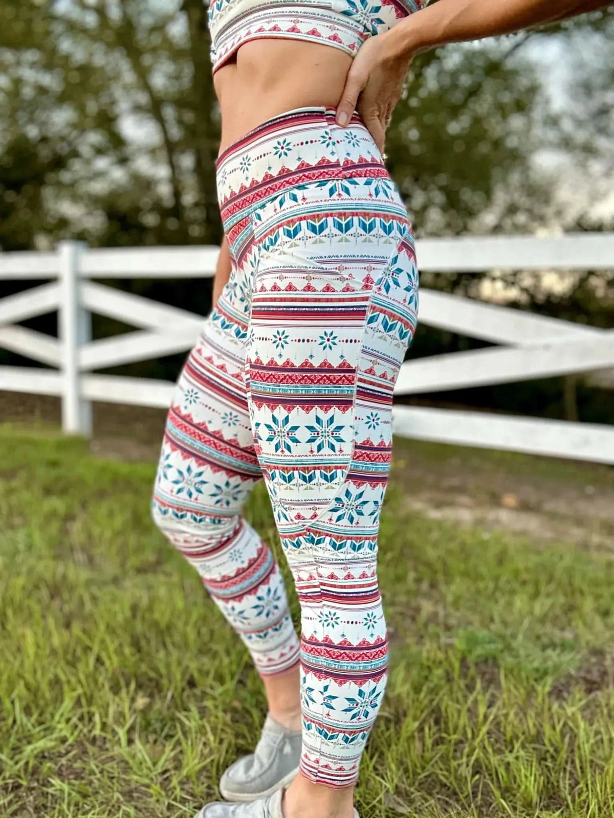 A person wearing Frosted patterned leggings and a matching crop top.
